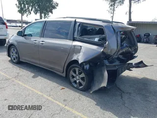 2015 Toyota Sienna SE with VIN 5TDXK3DCXFS680767, listed as a IAAI auction lot 42237107 with 105,912 mi miles and . Bid and sale history available at DreamBid. Image 3.