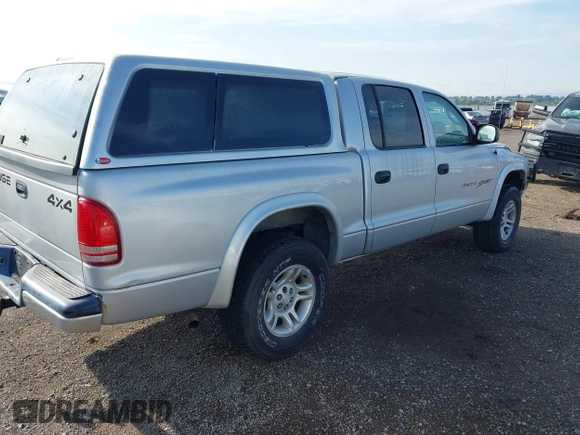 2001 Dodge Dakota Sport z VIN 1B7HG2AN91S290457, wystawiony jako IAAI lot #42381350 z przebiegiem 192 163 mil mil oraz . Historia ofert i sprzedaży dostępna na DreamBid. Obrazek 4.