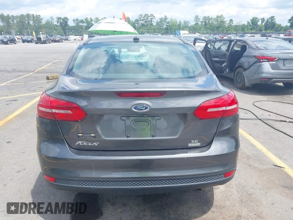 2018 Ford Focus SE with VIN 1FADP3FE2JL263954, listed as a IAAI auction lot 42480748 with 111,059 mi miles and . Bid and sale history available at DreamBid. Image 16.