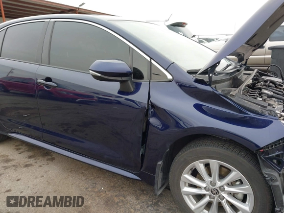 2023 Toyota Corolla Hybrid LE with VIN JTDBCMFE8PJ003081, listed as a IAAI auction lot 41041004 with 19,146 mi miles. Bid and sale history available at carsss.com. Image 17.