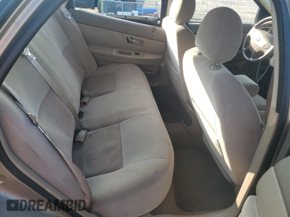 2003 Ford Taurus z VIN 1FAFP52253A170456, wystawiony jako Copart lot #70009824 z przebiegiem 216 567 mil mil oraz Szkoda całkowita • Salvage title. Historia ofert i sprzedaży dostępna na DreamBid. Obrazek 10.