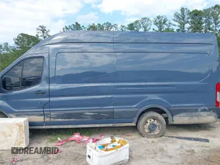 2019 Ford Transit z VIN 1FTYR3XMXKKB33312, wystawiony jako IAAI lot #42253712 z przebiegiem 68 590 mil mil oraz . Historia ofert i sprzedaży dostępna na DreamBid. Obrazek 14.