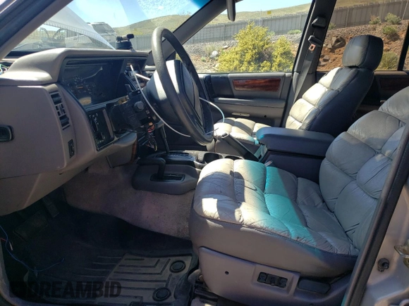 1994 Jeep Grand Cherokee Limited with VIN 1J4GZ78Y0RC190766, listed as a Copart auction lot 54628055 with 217,270 mi miles and Salvage title. Bid and sale history available at DreamBid. Image 7.