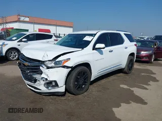 2018 Chevrolet Traverse Premier z VIN 1GNERKKW6JJ220965, wystawiony jako IAAI lot #37625637 z przebiegiem 99 072 mil mil oraz . Historia ofert i sprzedaży dostępna na DreamBid. Obrazek 18.