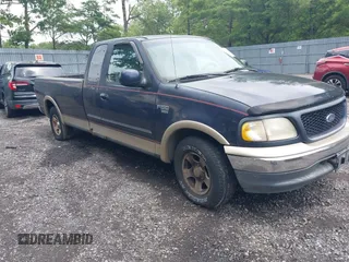 1999 Ford F-150 with VIN 2FTRX17WXXCB16599, listed as a IAAI auction lot 42642099 with 205,895 mi miles and . Bid and sale history available at DreamBid. Image 1.