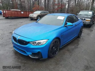 2015 BMW M4 with VIN WBS3U9C5XFJ968082, listed as a IAAI auction lot 41513593 with 57,715 mi miles. Bid and sale history available at carsss.com. Image 17.