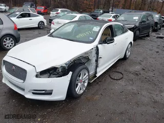 2017 Jaguar XJ with VIN SAJWA2G73H8W04310, listed as a IAAI auction lot 40914491 with 62,102 mi miles. Bid and sale history available at carsss.com. Image 2.