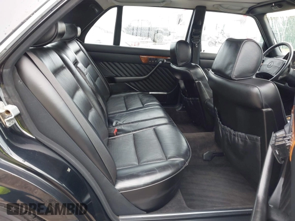 1990 Mercedes-Benz 560 with VIN WDBCA39E4LA534349, listed as a IAAI auction lot 42201056 with 211,470 mi miles and . Bid and sale history available at DreamBid. Image 8.