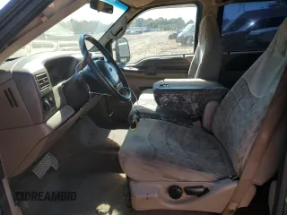 2000 Ford F-350 XL with VIN 1FTSW31F7YEE20820, listed as a Copart auction lot 77496284 with 312,193 mi miles and Salvage Title. Bid and sale history available at DreamBid. Image 7.