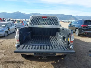 2014 Toyota Tacoma with VIN 3TMLU4EN3EM143882, listed as a IAAI auction lot 40657975 with 125,008 mi miles. Bid and sale history available at carsss.com. Image 16.