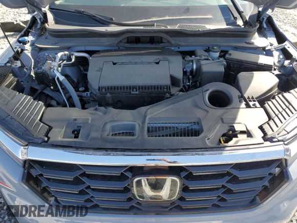 2024 Honda Pilot Touring with VIN 5FNYG2H79RB004803, listed as a Copart auction lot 49702415 with 27,406 mi miles and Salvage title. Bid and sale history available at DreamBid. Image 12.