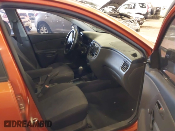 2009 Kia Rio LX with VIN KNADE223796547229, listed as a IAAI auction lot 41947371 with 153,061 mi miles and . Bid and sale history available at DreamBid. Image 5.