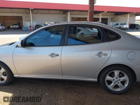2010 Hyundai Elantra GLS z VIN KMHDU4AD4AU126950, wystawiony jako IAAI lot #42009934 z przebiegiem 124 845 mil mil oraz . Historia ofert i sprzedaży dostępna na DreamBid. Obrazek 14.