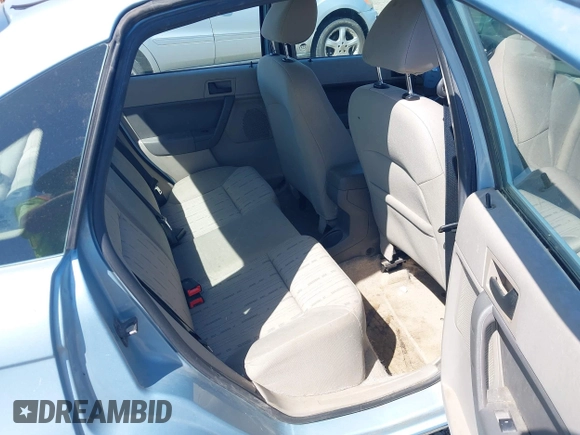 2008 Ford Focus SE z VIN 1FAHP35N58W226540, wystawiony jako IAAI lot #42383245 z przebiegiem 183 312 mil mil oraz . Historia ofert i sprzedaży dostępna na DreamBid. Obrazek 8.