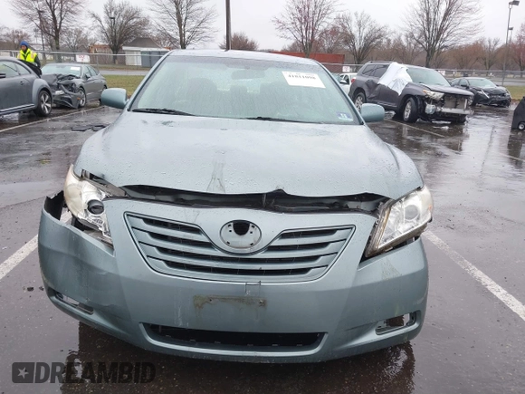 2007 Toyota Camry CE with VIN 4T1BE46K97U699024, listed as a IAAI auction lot 41811098 with 97,560 mi miles and . Bid and sale history available at DreamBid. Image 12.