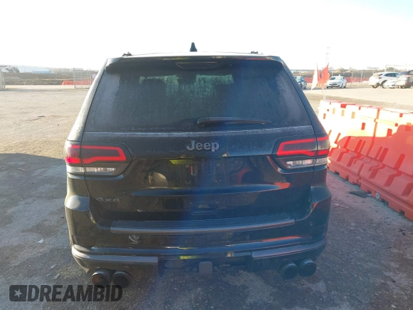 2018 Jeep Grand Cherokee High Altitude with VIN 1C4RJFCT4JC378030, listed as a IAAI auction lot 41319022 with 113,806 mi miles. Bid and sale history available at carsss.com. Image 16.