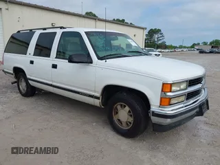 1999 Chevrolet Suburban with VIN 3GNEC16RXXG169156, listed as a IAAI auction lot 41981088 with 229,783 mi miles. Bid and sale history available at carsss.com. Image 1.