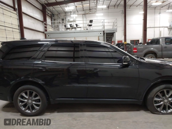 2015 Dodge Durango Limited with VIN 1C4RDJDG8FC904890, listed as a IAAI auction lot 42390110 with 159,971 mi miles and . Bid and sale history available at DreamBid. Image 14.