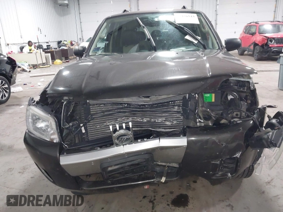 2006 Mercury Mariner Luxury с VIN 4M2CU56126KJ03006, выставлен на аукционе IAAI как лот 42476543 с пробегом 114 288 миль миль и . История ставок и продаж доступна на DreamBid. Изображение 12.