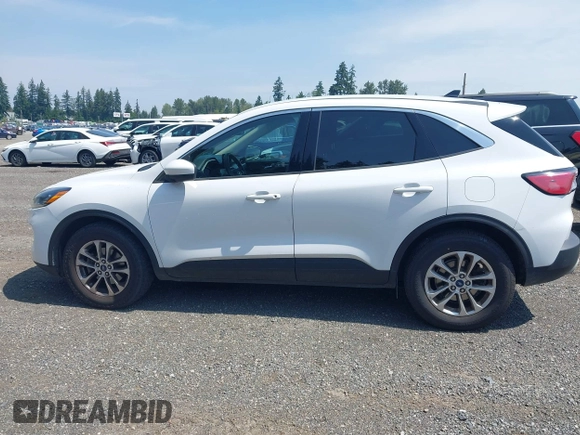2020 Ford Escape SE with VIN 1FMCU9G67LUA79806, listed as a IAAI auction lot 42560963 with 103,070 mi miles and . Bid and sale history available at DreamBid. Image 14.