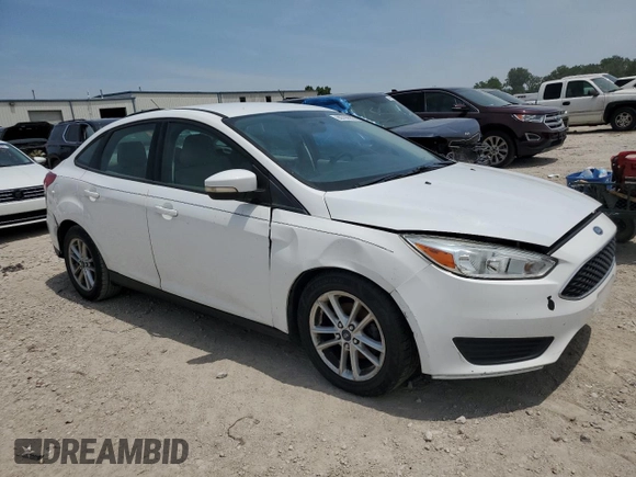 2016 Ford Focus SE with VIN 1FADP3F25GL404899, listed as a Copart auction lot 60785635 with Not provided miles and Clean title. Bid and sale history available at DreamBid. Image 4.