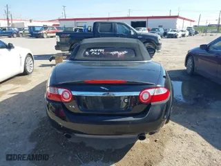 2007 Jaguar XK with VIN SAJDA44B975B01444, listed as a IAAI auction lot 41606094 with 155,227 mi miles. Bid and sale history available at carsss.com. Image 16.