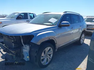 2023 Volkswagen Atlas SE z VIN 1V2JR2CA4PC526973, wystawiony jako IAAI lot #41712167 z przebiegiem 77 370 mil mil oraz . Historia ofert i sprzedaży dostępna na DreamBid. Obrazek 2.