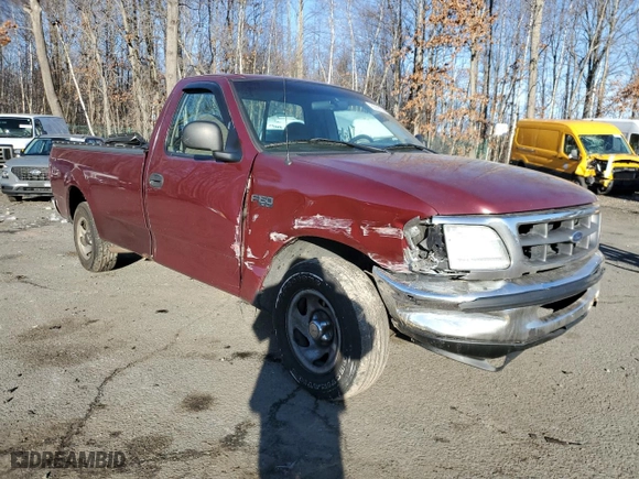 1997 Ford F-150 Standard with VIN 1FTDF1721VNA54544, listed as a Copart auction lot 85661394 with 221,536 mi miles and Salvage Title. Bid and sale history available at carsss.com. Image 4.