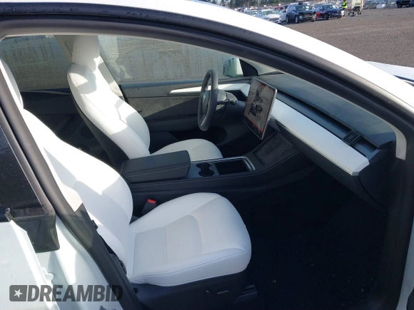 2024 Tesla Model Y Long Range with VIN 7SAYGDEE1RF056816, listed as a IAAI auction lot 41809125 with 6,434 mi miles and . Bid and sale history available at DreamBid. Image 5.