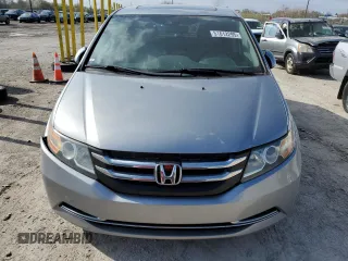 2016 Honda Odyssey EX-L with VIN 5FNRL5H67GB026899, listed as a Copart auction lot 51612295 with 74,010 mi miles and Salvage Title. Bid and sale history available at DreamBid. Image 5.