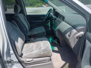 2002 Honda Odyssey EX z VIN 2HKRL18692H526842, wystawiony jako IAAI lot #42495810 z przebiegiem 220 289 mil mil oraz . Historia ofert i sprzedaży dostępna na DreamBid. Obrazek 5.