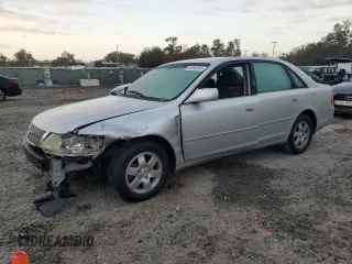 2002 Toyota Avalon XL with VIN 4T1BF28B32U263941, listed as a Copart auction lot 83993504 with 118,438 mi miles and Salvage Title. Bid and sale history available at DreamBid. Image 1.