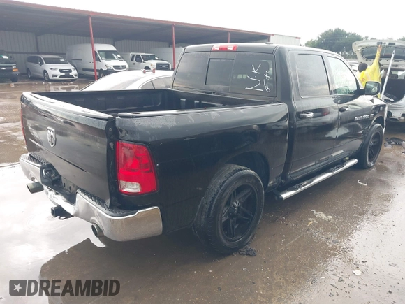 2011 Ram 1500 Laramie with VIN 1D7RB1CT6BS663647, listed as a IAAI auction lot 42641864 with 265,188 mi miles and . Bid and sale history available at DreamBid. Image 4.