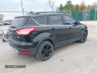 2015 Ford Escape SE with VIN 1FMCU9GX8FUC41438, listed as a IAAI auction lot 41869587 with 109,728 mi miles. Bid and sale history available at carsss.com. Image 4.