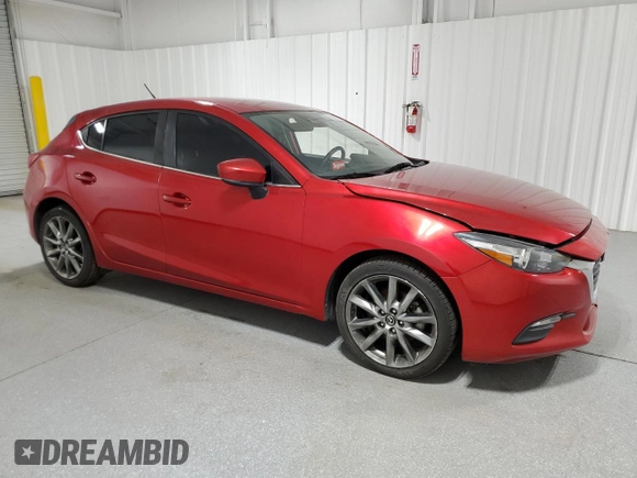 2018 Mazda 3 Touring with VIN 3MZBN1L34JM177605, listed as a Copart auction lot 52559395 with 56,267 mi miles and Clean Title. Bid and sale history available at DreamBid. Image 4.