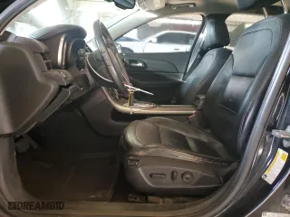 2013 Chevrolet Malibu LTZ with VIN 1G11J5SX8DF249828, listed as a Copart auction lot 82665394 with 209,370 mi miles and Salvage Title. Bid and sale history available at carsss.com. Image 7.