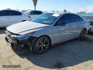 2022 Hyundai Elantra N with VIN KMHLW4AK8NU006711, listed as a IAAI auction lot 41885577 with 15,735 mi miles. Bid and sale history available at carsss.com. Image 18.
