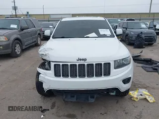 2015 Jeep Grand Cherokee Altitude with VIN 1C4RJEAG2FC901391, listed as a IAAI auction lot 41565763 with 220,685 mi miles. Bid and sale history available at carsss.com. Image 12.