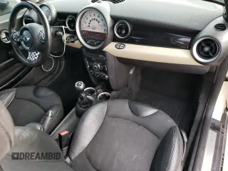 2012 MINI Hardtop with VIN WMWSU3C51CT186184, listed as a Copart auction lot 55090935 with 100,669 mi miles and Salvage Title. Bid and sale history available at DreamBid. Image 8.