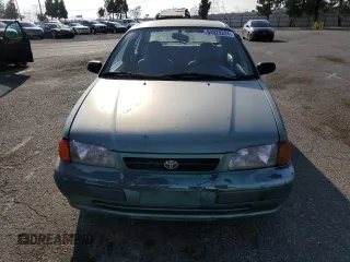 1995 Toyota Tercel DX z VIN JT2EL56E2S7019018, wystawiony jako Copart lot #84929224 z przebiegiem 241 078 mil mil oraz Szkoda całkowita • Salvage title. Historia ofert i sprzedaży dostępna na DreamBid. Obrazek 5.