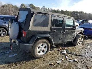 2015 Jeep Wrangler Unlimited Sahara with VIN 1C4BJWEG3FL530114, listed as a Copart auction lot 88851565 with 156,669 mi miles and Salvage Title. Bid and sale history available at carsss.com. Image 3.