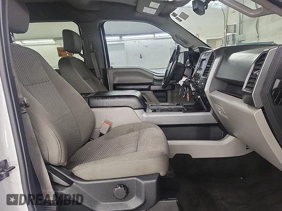 2018 Ford F-150 XL with VIN 1FTEW1E59JKD11351, listed as a IAAI auction lot 42663848 with 128,761 mi miles and . Bid and sale history available at DreamBid. Image 5.