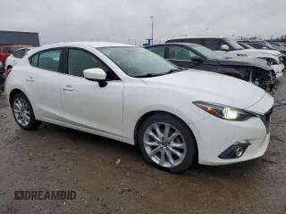 2014 Mazda 3 S Touring with VIN JM1BM1L38E1125578, listed as a Copart auction lot 86875654 with 142,759 mi miles and Salvage Title. Bid and sale history available at DreamBid. Image 4.