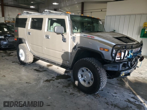 2003 Hummer H2 with VIN 5GRGN23U53H101713, listed as a Copart auction lot 85216034 with 189,549 mi miles and Non Repairable. Bid and sale history available at carsss.com. Image 4.