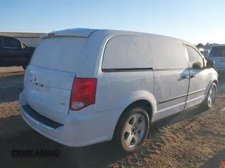 2014 Ram Cargo Van Tradesman with VIN 2C4JRGAGXER230933, listed as a IAAI auction lot 41166912 with 249,840 mi miles. Bid and sale history available at carsss.com. Image 4.