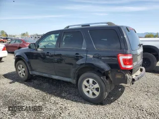2011 Ford Escape Limited with VIN 1FMCU9EGXBKA75058, listed as a Copart auction lot 51312665 with 121,220 mi miles and Salvage Title. Bid and sale history available at DreamBid. Image 2.