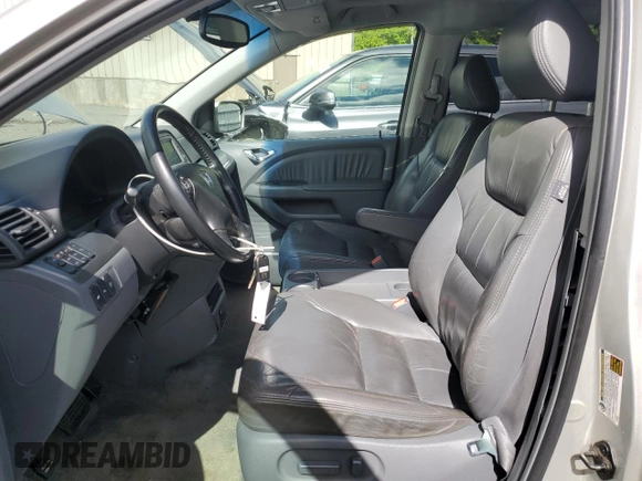 2005 Honda Odyssey Touring z VIN 5FNRL38835B071258, wystawiony jako Copart lot #57878295 z przebiegiem 143 474 mil mil oraz Szkoda całkowita • Salvage title. Historia ofert i sprzedaży dostępna na DreamBid. Obrazek 7.