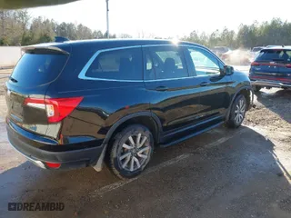 2021 Honda Pilot EX-L with VIN 5FNYF5H54MB038028, listed as a IAAI auction lot 41398565 with 63,779 mi miles. Bid and sale history available at carsss.com. Image 4.