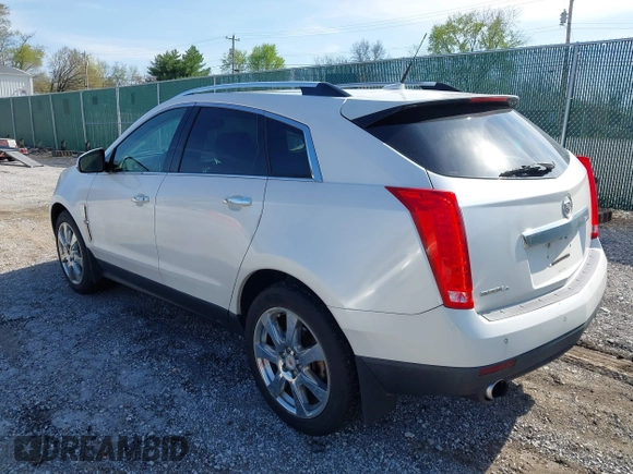 2011 Cadillac SRX Performance Collection with VIN 3GYFNEEYXBS559777, listed as a IAAI auction lot 41901651 with 177,662 mi miles. Bid and sale history available at carsss.com. Image 3.