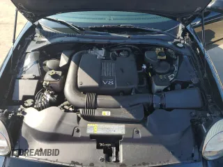 2002 Ford Thunderbird Hardtop Premium z VIN 1FAHP60A52Y122437, wystawiony jako Copart lot #73883244 z przebiegiem Nie podano mil oraz Nie do naprawy • Non repairable. Historia ofert i sprzedaży dostępna na DreamBid. Obrazek 11.
